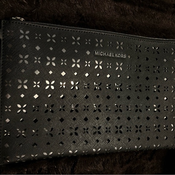 Michael Kors Women’s Floral Perforated Large Zip Clutch - Picture 6 of 13